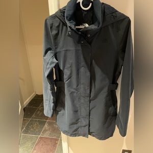 Navy Blue North Face hooded utility jacket.